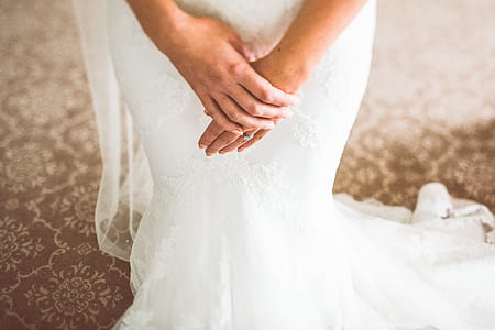 woman wearing white lace wedding dress thumbnail