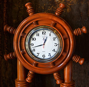 brown and white ships helm analog clock thumbnail