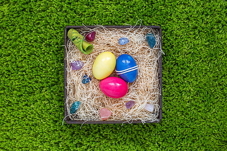 three colored eggs in box thumbnail