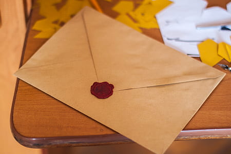 Brown Paper Envelope on Table thumbnail
