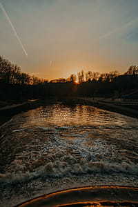 Silhouette of  water body and trees thumbnail