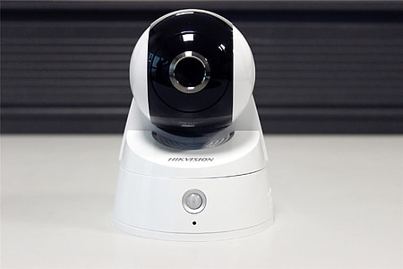 white and black Hikvision webcam thumbnail