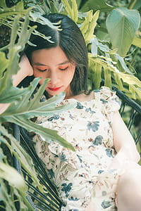 Woman Beside Green-leafed Plants thumbnail