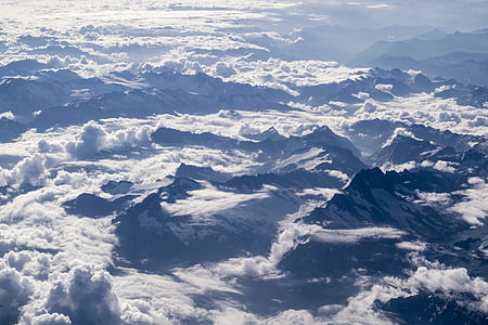 aerial photo of gray mountains covered with snow thumbnail