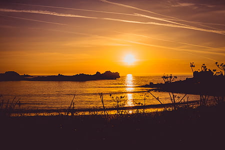 silhouette of island during dawn thumbnail