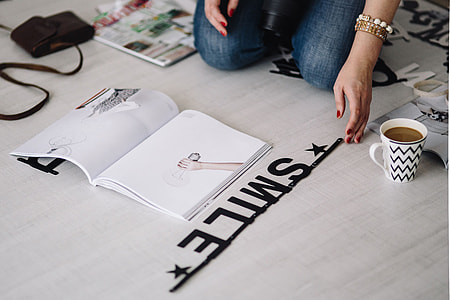 Woman arranging scrambled letters thumbnail