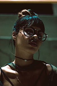 woman wearing eyeglasses with black frames facing camera thumbnail
