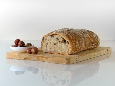 Bread on Top of Brown Wooden Chopping Board thumbnail