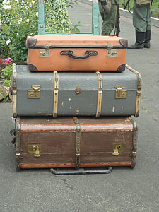three assorted suitcases thumbnail