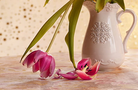 pink tulips in white vase centerpiece thumbnail