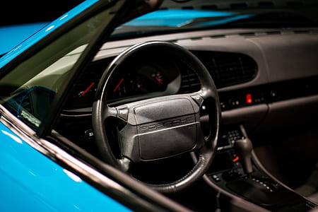 teal Porsche vehicle thumbnail