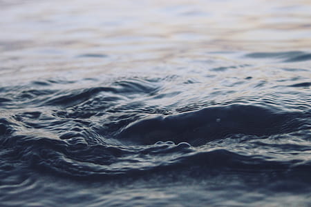 Close Up Photography of Body of Water thumbnail