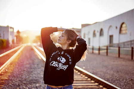 woman wearing black pullover hoodie thumbnail