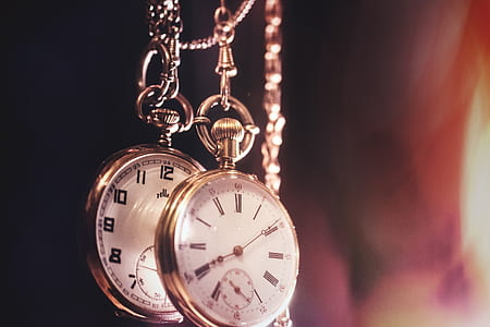 two silver-colored pocket watches thumbnail