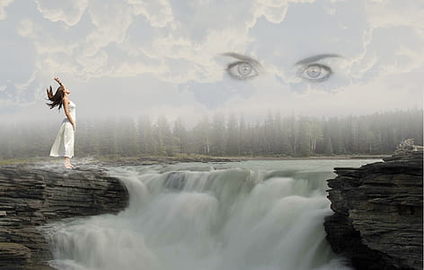 woman wearing sleeveless dress near waterfalls thumbnail