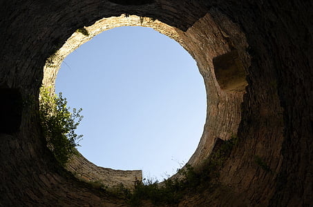 bottom-view of ruined tower during daytime thumbnail