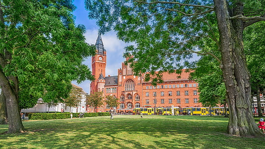 orange concrete building during daytime thumbnail