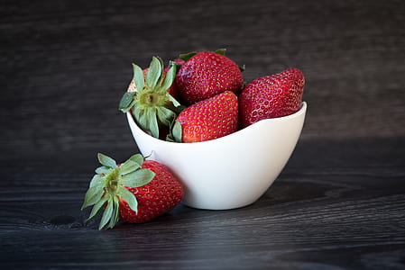 strawberries in round white ceramic bowl thumbnail