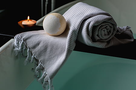 brown bath bomb on gray textile thumbnail