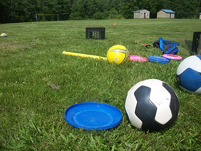blue flying disc next to black-and-white soccer ball thumbnail