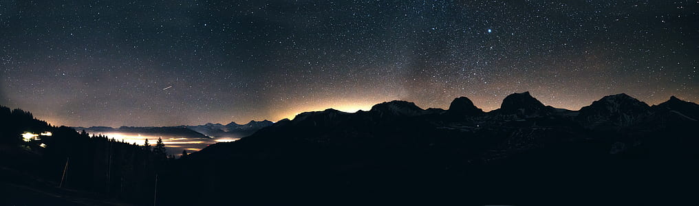 mountains under starry sky thumbnail