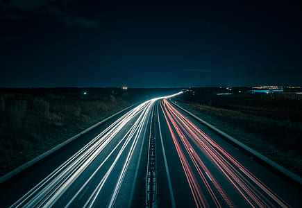 time-lapse photography of road with cars thumbnail