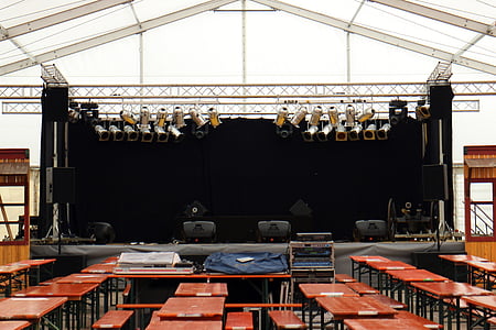 tables beside stage thumbnail