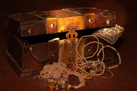 jewelries on brown wooden chest box thumbnail