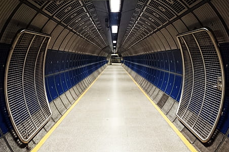 photo of blue and grey tunnel during daytime thumbnail