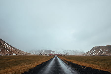 landscape photography of empty roadway thumbnail