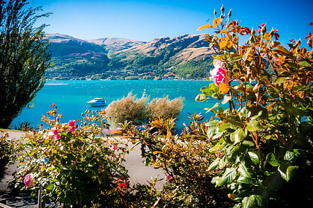 boat on sea near mountains thumbnail