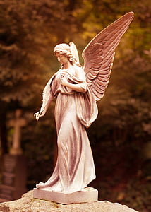 angel figurine in selective focus photography thumbnail