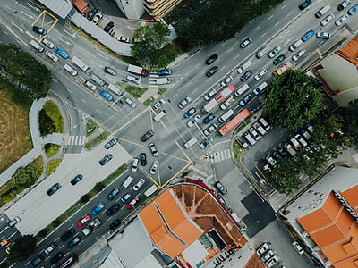 aerial photo of urban city with busy road at daytime thumbnail