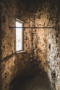 Light Reflecting on Brown Wall from Windowpane thumbnail
