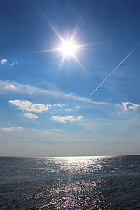 body of water under sun thumbnail