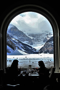 Beautiful Mountain through a window from a dining place in Banff National Park, Alberta, Canada thumbnail