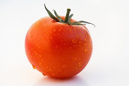 red cherry tomato on white surface thumbnail