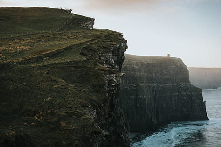 mountain cliff near sea thumbnail