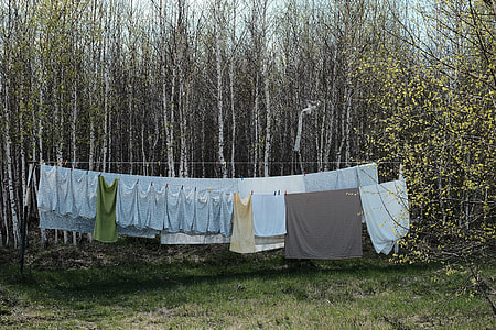 blue textile hanging on clothesline thumbnail