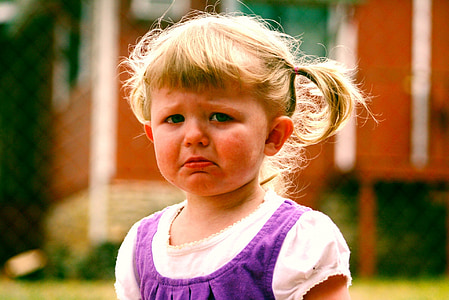 girl wearing purple and white top thumbnail