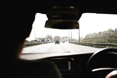 running vehicles on road during daytime thumbnail