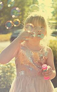 girl playing bubbles thumbnail