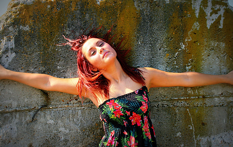 woman with red haired positng for photo thumbnail