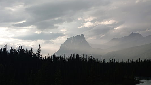 widescreen photo of mountain covered fog thumbnail