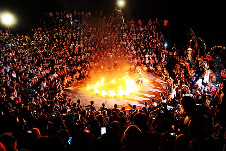 crowded people watching ring fire exhibition at night time thumbnail