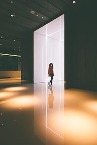woman walking inside building thumbnail
