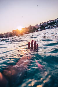Person Swimming At The Beach thumbnail