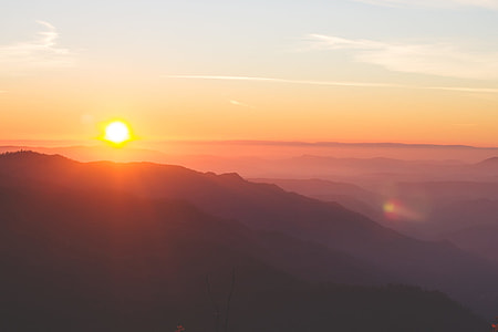 silhouette of mountain during golden hour thumbnail