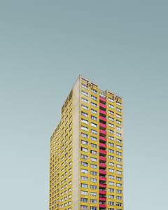 high rise building under clear sky thumbnail