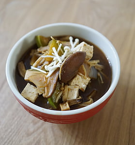 tofu dish on white and red ceramic bowl thumbnail